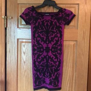 Bebe bodycon jacquard patterned cap sleeve dress.